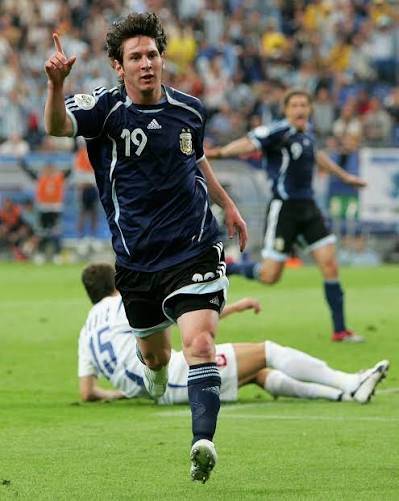 Young Lionel Messi celebrating a goal for Argentina at the 2006 World Cup